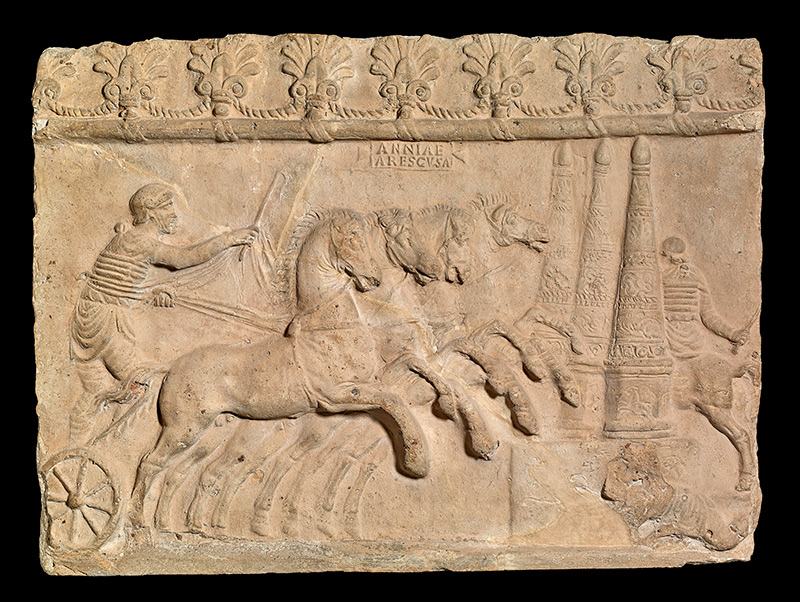 Terracotta relief showing a chariot-race, Italy, AD 40–70 © The Trustees of the British Museum. 